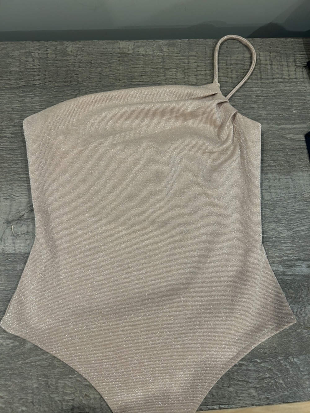 Lovers & Friends Shimmery One-Shoulder Bodysuit in Light Champagne